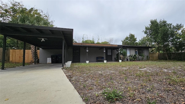 view of front of home featuring a carport