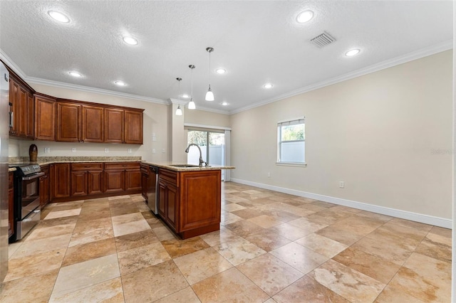 kitchen featuring baseboards, a peninsula, stainless steel appliances, a textured ceiling, and a sink