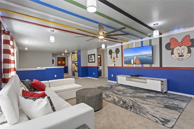 living room with ceiling fan, carpet floors, and a textured ceiling