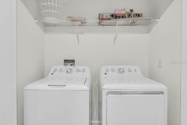 laundry room with laundry area and separate washer and dryer