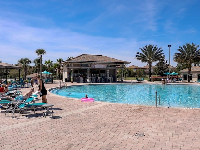 community pool featuring a patio