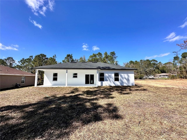 rear view of house with a patio area