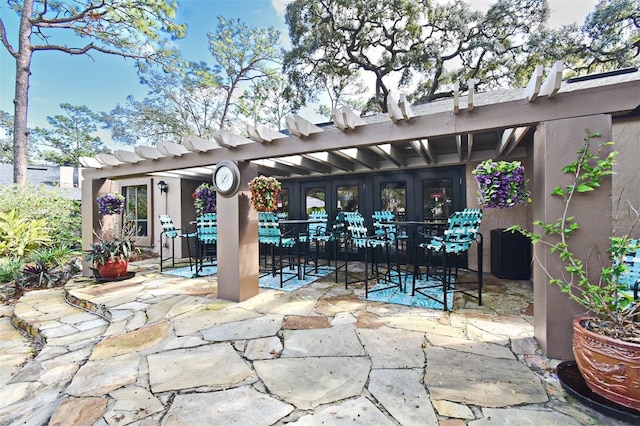 view of patio featuring french doors