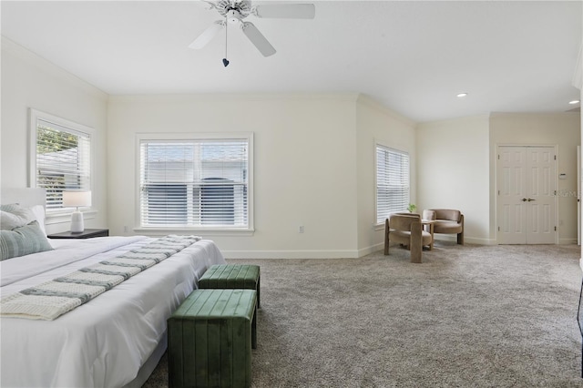 bedroom featuring crown molding, ceiling fan, carpet, and baseboards