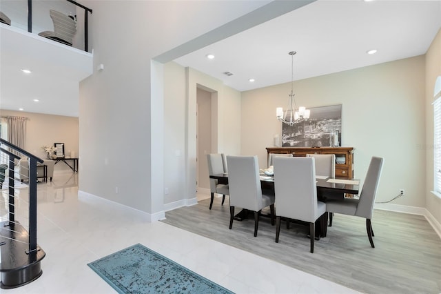 dining area featuring visible vents, baseboards, stairway, an inviting chandelier, and recessed lighting