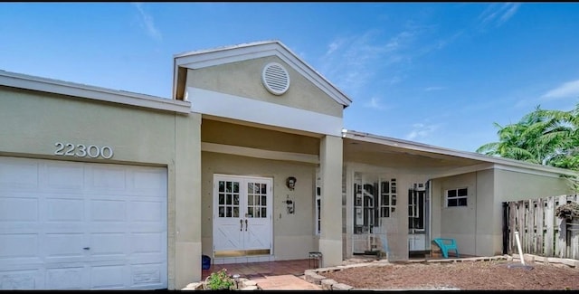 view of front of property with a garage