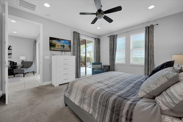 bedroom featuring access to outside, multiple windows, visible vents, and light colored carpet