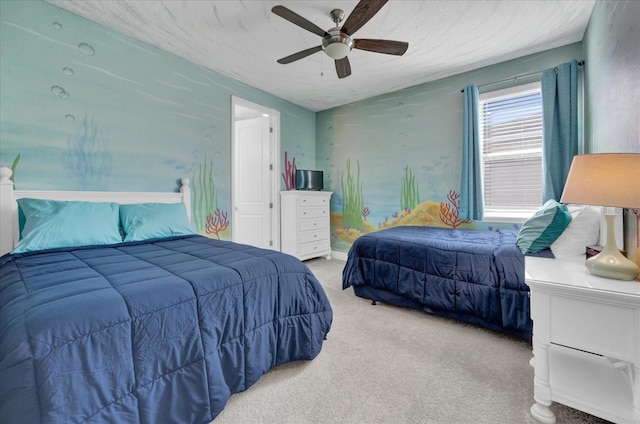 bedroom with ceiling fan and carpet floors