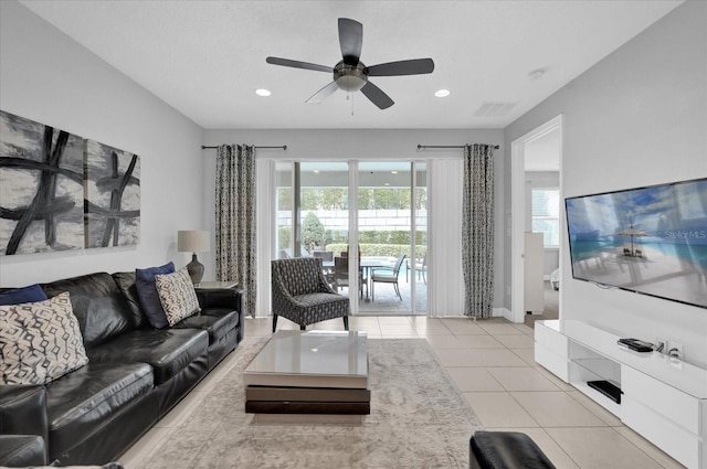 living area with plenty of natural light, recessed lighting, ceiling fan, and light tile patterned flooring