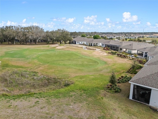 birds eye view of property featuring golf course view