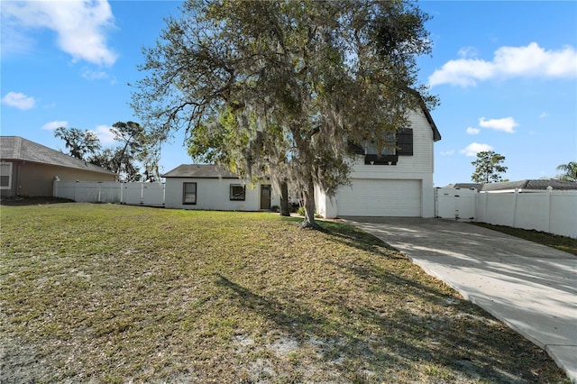 2531 Ludlow St, Deltona, FL 32738 - view of front of property with a garage, driveway, fence, and a front lawn