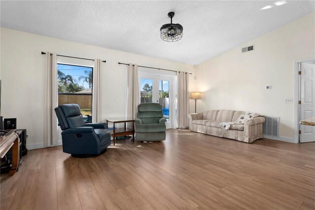 2531 Ludlow St, Deltona, FL 32738 - living room featuring visible vents, a textured ceiling, and wood finished floors