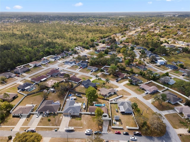 2531 Ludlow St, Deltona, FL 32738 - aerial view featuring a wooded view and a residential view