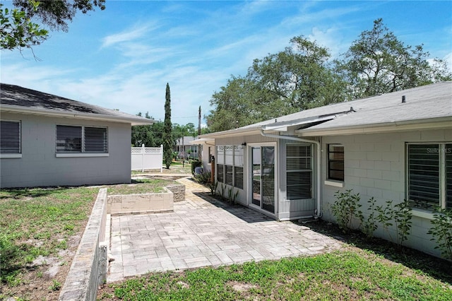 exterior space with a patio area and fence