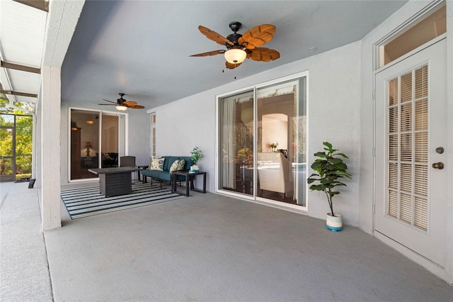 view of patio featuring ceiling fan