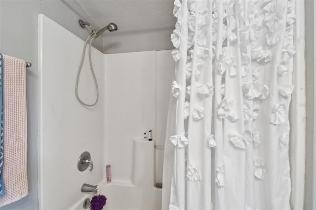 full bathroom with shower / bath combo with shower curtain