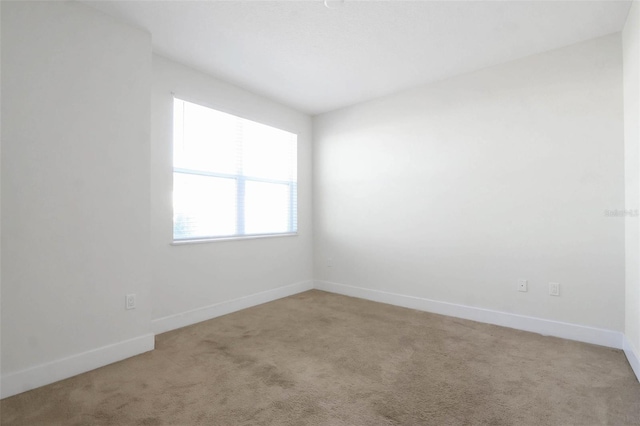17442 Hidden Forest Dr, Clermont, FL 34714 - carpeted spare room featuring baseboards