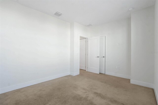 17442 Hidden Forest Dr, Clermont, FL 34714 - unfurnished room featuring carpet floors and baseboards