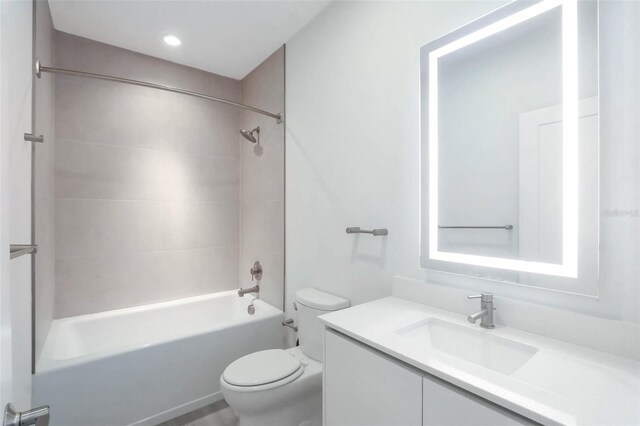 17442 Hidden Forest Dr, Clermont, FL 34714 - bathroom featuring toilet, vanity, and shower / bathtub combination