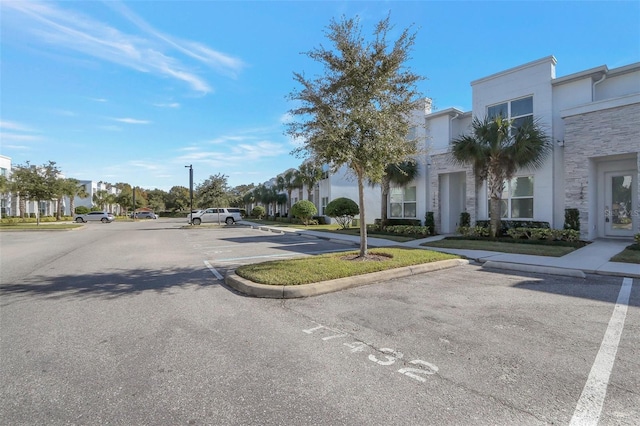 17442 Hidden Forest Dr, Clermont, FL 34714 - view of asphalt street featuring curbs and sidewalks