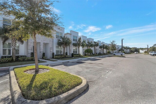 17442 Hidden Forest Dr, Clermont, FL 34714 - view of asphalt street featuring a residential view and curbs