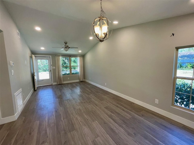 unfurnished room with a wealth of natural light, dark wood-style flooring, visible vents, and recessed lighting