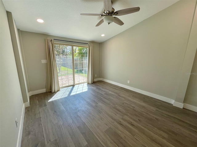 empty room featuring a ceiling fan, recessed lighting, baseboards, and wood finished floors