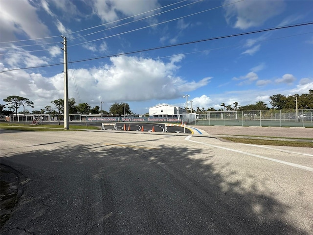 view of road featuring curbs