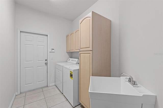 1203 Gatwick Loop, Lake Mary, FL 32746 - laundry room with washer and dryer, cabinet space, baseboards, and light tile patterned floors