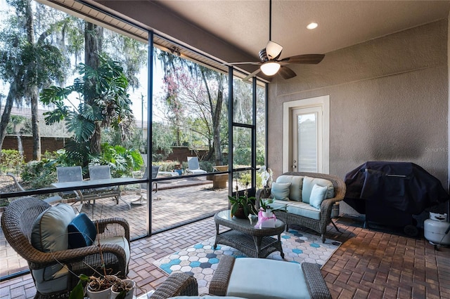 1203 Gatwick Loop, Lake Mary, FL 32746 - sunroom / solarium featuring a ceiling fan and an outdoor hangout area