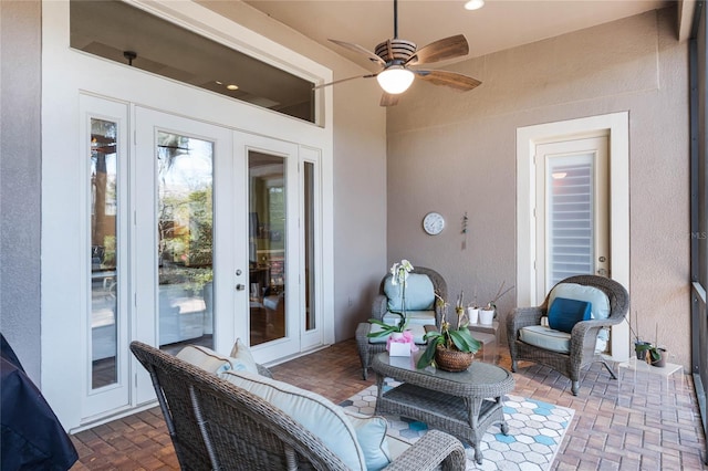 1203 Gatwick Loop, Lake Mary, FL 32746 - sunroom with french doors, ceiling fan, and an outdoor living space