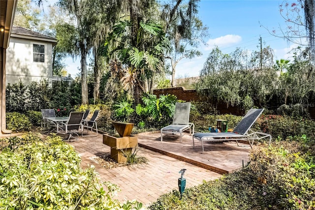 1203 Gatwick Loop, Lake Mary, FL 32746 - view of patio with a deck