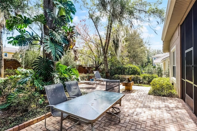 1203 Gatwick Loop, Lake Mary, FL 32746 - fenced backyard featuring a patio and outdoor dining space
