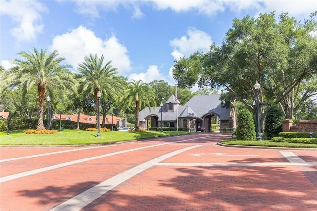 1203 Gatwick Loop, Lake Mary, FL 32746 - view of decorative road with street lights and curbs