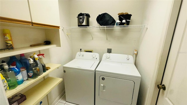 laundry room with laundry area and washing machine and dryer