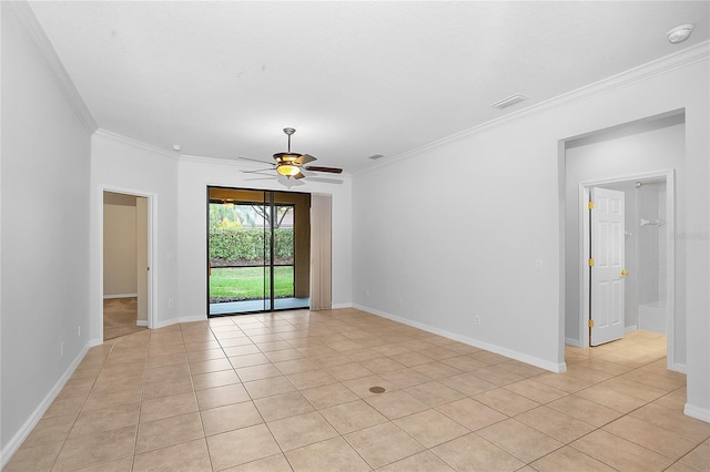 spare room featuring visible vents, baseboards, ceiling fan, crown molding, and light tile patterned flooring