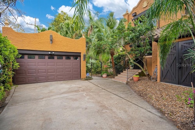 detached garage with fence