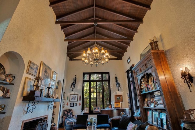 sitting room with high vaulted ceiling, wood ceiling, a fireplace, and beamed ceiling