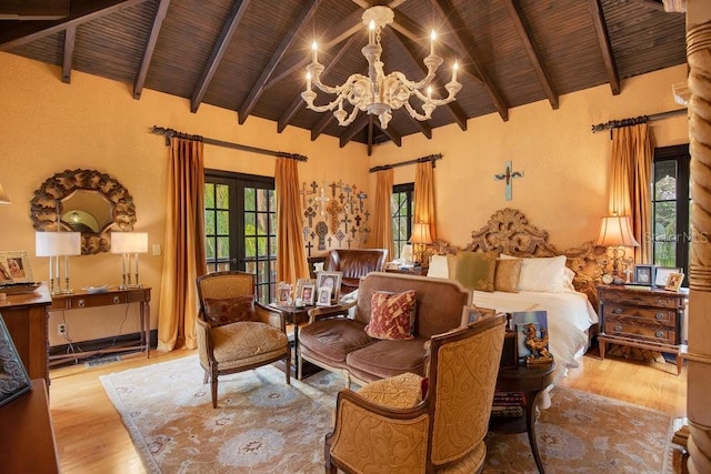 bedroom with wooden ceiling, multiple windows, and wood finished floors