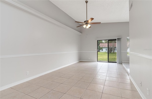 unfurnished room featuring light tile patterned floors, visible vents, baseboards, ceiling fan, and a textured ceiling