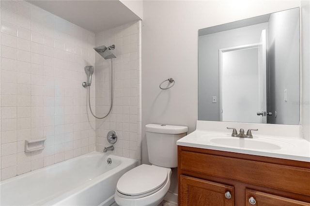 full bath featuring toilet, washtub / shower combination, and vanity