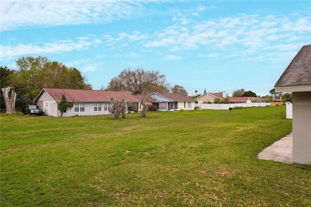 view of yard featuring fence