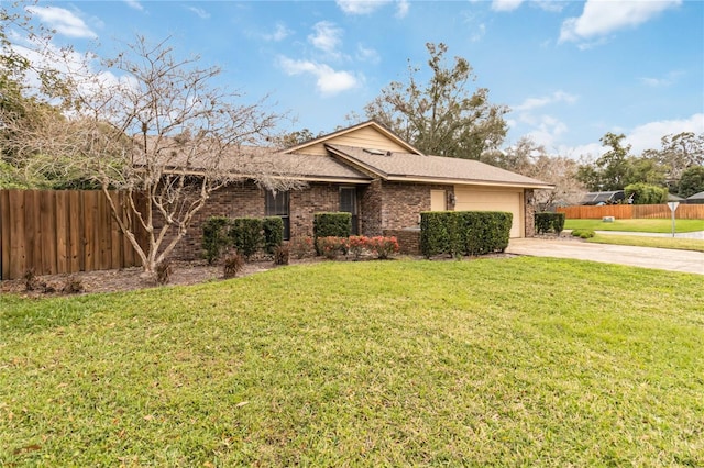 ranch-style home featuring brick siding, concrete driveway, a front yard, fence, and a garage