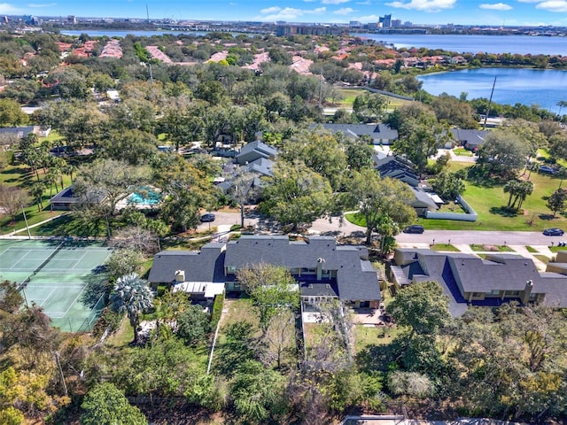 bird's eye view featuring a water view and a residential view