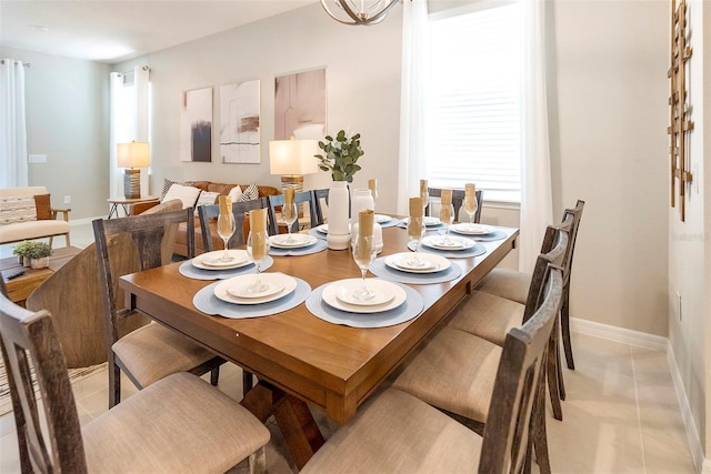 3432 Lilac Way, Davenport, FL 33897 - dining space featuring baseboards and light tile patterned flooring