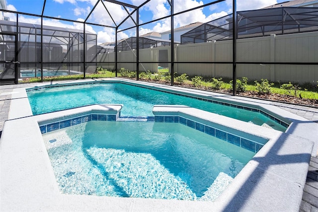 3432 Lilac Way, Davenport, FL 33897 - view of pool featuring a pool with connected hot tub and a lanai