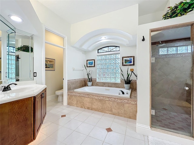 bathroom with a wealth of natural light, a shower stall, and a bath