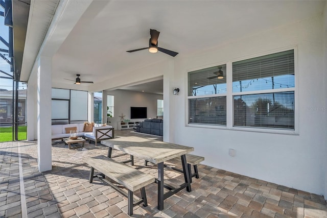 view of patio featuring outdoor lounge area and ceiling fan