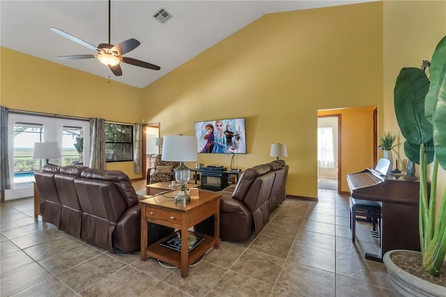 2825 Lake Tohopekaliga Blvd, Kissimmee, FL 34746 - living room with tile patterned flooring, visible vents, high vaulted ceiling, and ceiling fan