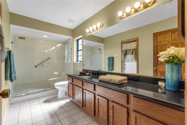2825 Lake Tohopekaliga Blvd, Kissimmee, FL 34746 - bathroom featuring a shower stall, tile patterned floors, vanity, and toilet